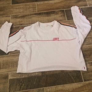 White long sleeve Levi’s crop top.